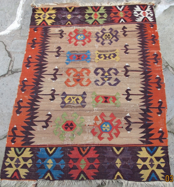 Rare small format 18th. century Anatolian kelim, overall design on a camel field,
showing a plethora of scintillating colors, including apple green,
and an intense aubergine, 50" X 36"[127 X 92cm]    