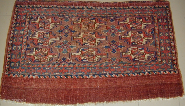 Monumental Yomud Chuval 50'' X 31''(127 X 79cm), early 19th. century, corrosive insect dye highlights, original side cords
               