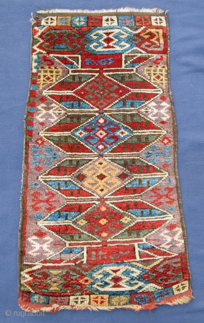 Dated rare early western Anatolian Yastik, full pile with early natural colors, 
original selvedges and remains of original kelim at both ends,
29" X 16"[74 X 40cm]  See Morehouse # 37  