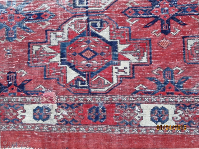 Early finely woven Turkmen Chuval with gigantic Guls showing 3ply asymmetric knotting inclined to the left, wefting comprised of delicately twisted together cotton and woolen yarns, 64" X 31"[163 X 79cm] 18th.  ...