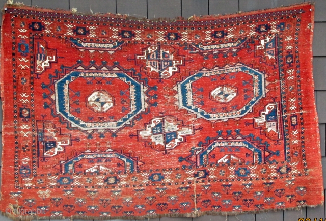 Early large finely woven Arabachi Chuval showing Salor and Chuval Guls, asymmetric 3 ply knots open left,
highly corrosive red insect dye, red and blue silk highlights, cotton highlights, pepper and salt wefting
comprised  ...