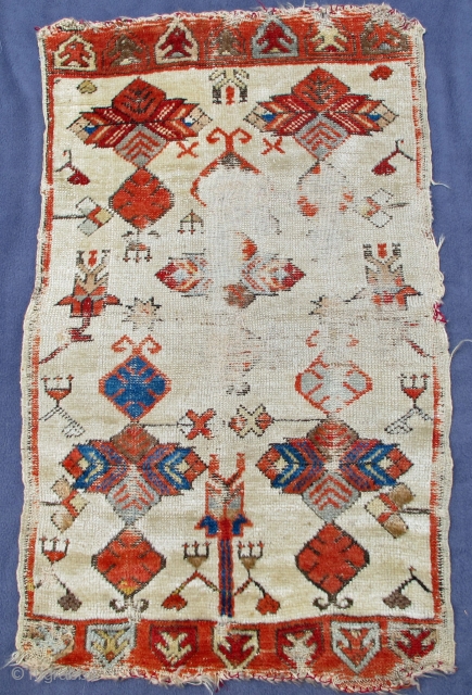 Ancient Yastik showing designs of archaic Turkmen jewelry,
early natural beautiful dyes, 34" X 25"[87 X 62cm]                 