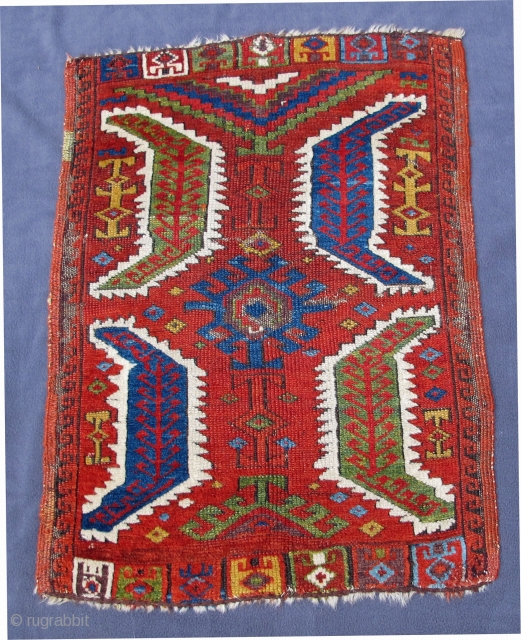 Central Anatolian Yastik with beautiful  colors including aubergine in very good condition, original selvedges,
early 19th century, 29" X 21"[74 X 54cm]  see Morehouse, p. 49 #60.     