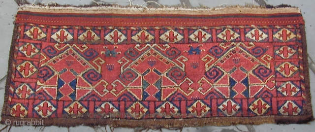 Archaic Uzbek trapping with original side finishes, kelim top and bottom, 19th century, excellent condition, 43'' X 18'' (108 X 46cm)            