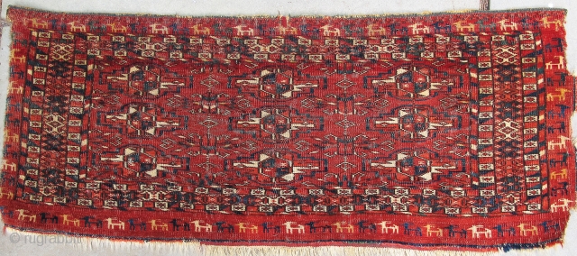 Finely woven Tekke mafrash with procession of differently colored goats in outer border,
19th. century,28'' X 11''(71 X 28cm)               