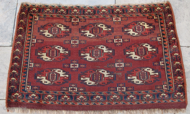  Yomud Chuval with unusual rare gul interiors, finely woven with beautiful colors, early 19th. century, 37'' X 24''(94 X 60cm).            