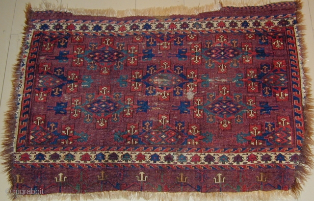 The earliest and most archaic Kepse Gül Chuval I have ever encountered.  The piece is very finely woven with
extraordinary colors including a clear corrosive green.  Wefting is replete with cotton  ...