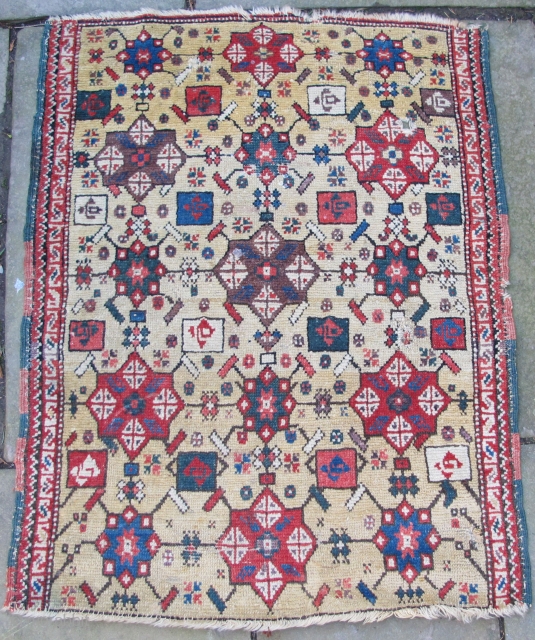 Rare Central Anatolian Yastik, 18th. century, yellow field color in photo is really not indicative of the actual intensity of the piece, original side cords,
31" X 24"[79 Z 61cm]    