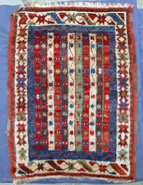 Yürück Yastik woven with luminescent wool from high mountain sheep,
thick shiny pile,
incredible natural colors including an intense aubergine,
remainder of a glue application on the back needful of further removal,
19th. century, 35" X  ...