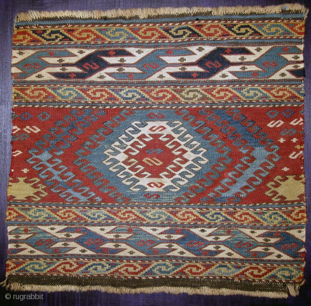 Finely woven sumak mafrash end panel.                           