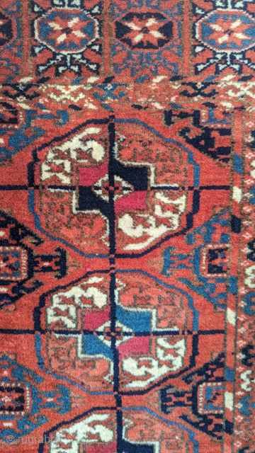 Antique Tekke Wagireh(Sampler)? rug, circa 1900 or before with wonderfully drawn guls and a unique border design. It is a great example of Tekke weaving with cochineal red dyes, greens, and indigos.  ...