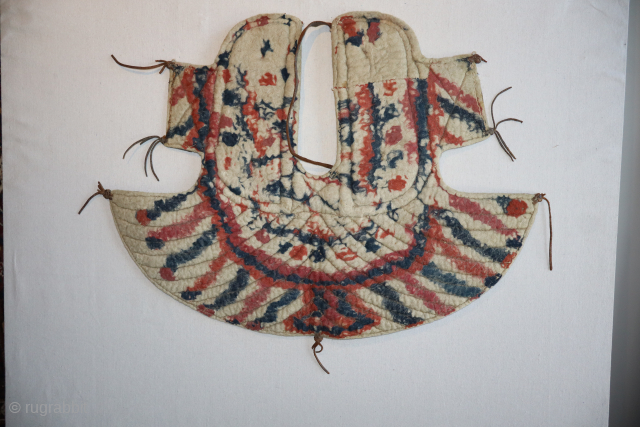 This is an exceptionally rare felt horse saddle cover, made by the Yumut tribe of Central Asia around 1880 or before. Its is made using all-natural felt wool in multiple colors. The  ...