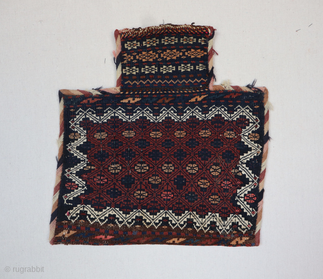 A charming Baktiyari saltbag from Persia, circa 1930 or before, with wonderful deep saturated colors and design. It is a fine example of tribal weave with an original multi colored back. All  ...
