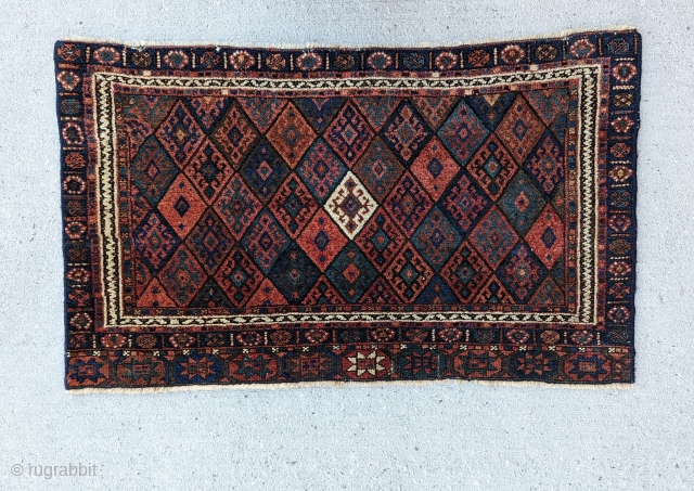 A beautiful  Antique Jaff Kurd Mafrash panel, wonderful use of colors,blues,greens and the white diamond in middle,circa 1920 or before,Great condition,size 2'2" × 3'8"        
