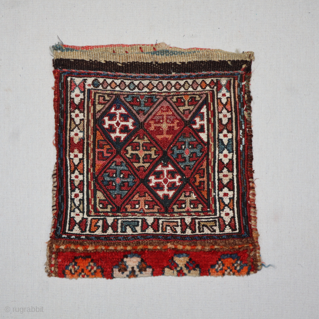 A finely woven late 19th-century Qashqai chanteh, with excellent colors and design elements. It has a very nice band of carpet. Cotton is used for the white, which is highly unusual and  ...