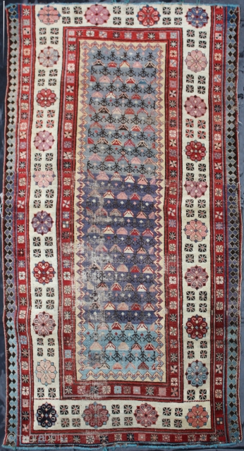 Gendje Rug

Category: 	Antique
Origin: 	Caucasian 
City/Village: 	Caucasia
Size cm: 	105 x 200
Size ft: 	3'6'' x 6'8''
Code No: 	R2890
Availability: 	In Stock

This rug is over hundred years old and some minor damage and cut and shut 