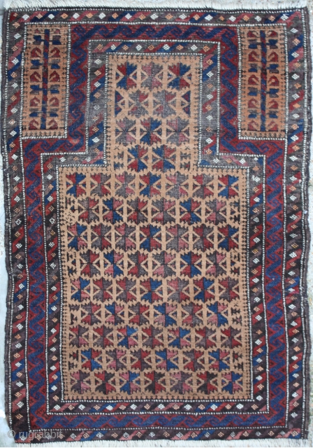 Antique Balouch Rug,
Size cm:130 x 80,
Size ft:4'4 x 2'8,
Code No:R3871,
Availability:In Stock,
This rug is around 75 to 80 years old and some minor damage          