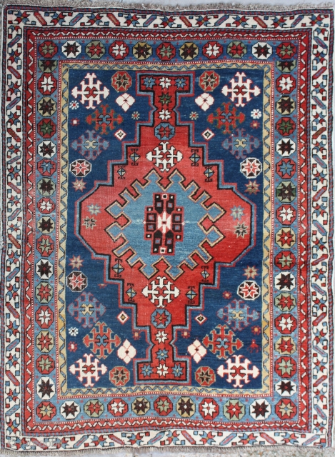 Antique Kazak Rug,
Location:UK, Size cm:140 x 110, Size ft:4'8 x 3'8, Code No: R2882
Availability: Sold, Antique Kazak Rug: This rug is around 75 to 80 years old and good condition.   