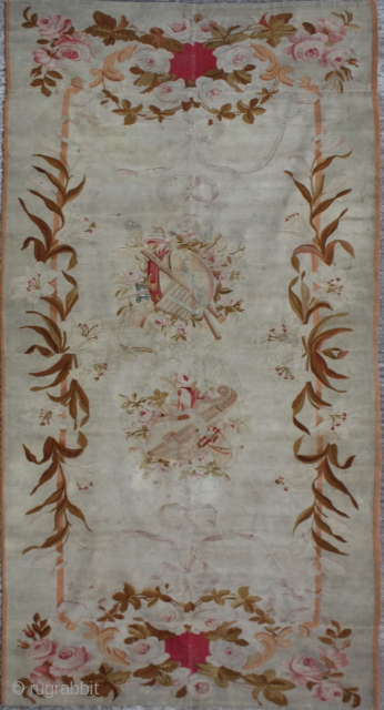 Aubusson Rug 	
Age:Antique
Origin: French 	
City/Village: 	Aubusson
Size cm: 	300 x 115
Size ft: 	10'0 x 3'10
Code No: 	R5743
Availability: 	In Stock


This rug is over hundred year’s old and very good condition.     