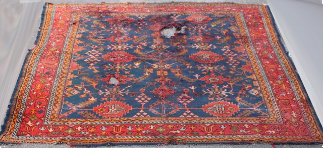 Antique Ushak Carpet
	
Age:Antique,
Origin:Turkish,
City/Village: 	Ushak,
Size cm: 	340 x 240,
Size ft: 	11'4 x 8'0,
Code No: 	R5831,
Availability: 	In Stock,This rug is over hundred years old and some major damage       