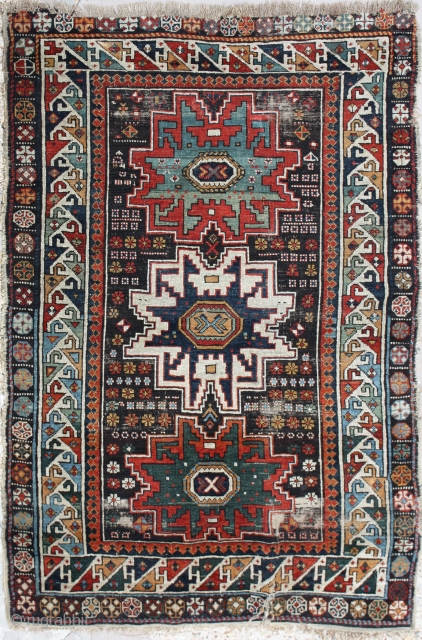 Antique Caucasian Lesgi Rug,
Size cm:150 x 105,
Size ft:5'0 x 3'6,
Code No:R6906,
Availability:In Stock,
This rug is around 75 to 80 years old and some minor damage
         