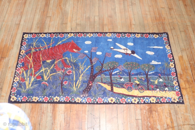 Antique INdonesian textile.  What a lovely subject with an airplane wagon and tiger on top of the hills!  3'x6'.            