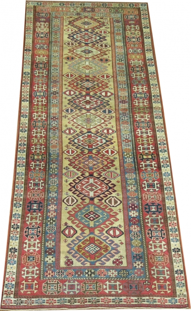 Antique Caucasian Shirvan Size 3'1''x8'3''.  Has been professionally repaired by an expert.  Rare golden yellow field!               