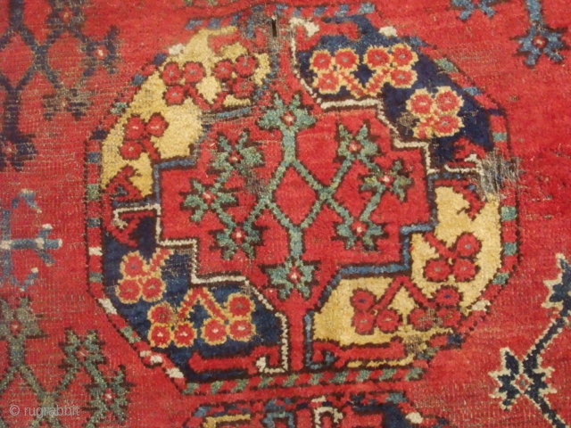 An un-useable Ersari rug. The end kilims are not original and were sewn to the rug at a much later date. Size doesn't matter!         