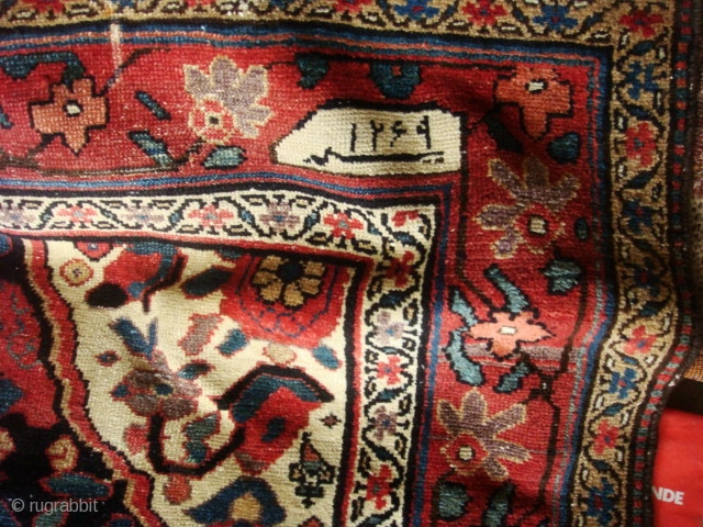 Dated 1269 AH = 1852 AD. A Koliayee Kurdish rug measuring 9'x5.5' = 278 X 165 cm, masterfully rewoven ends, original sides, tightly clipped with no visible collars.
     