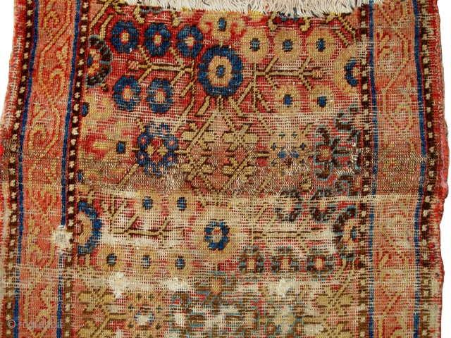 Khotan runner fragment, earlier type with nicely drawn narrow borders. All good colors, blue and white cotton and several brown wool weft. worn. 5'3"x2'5"         