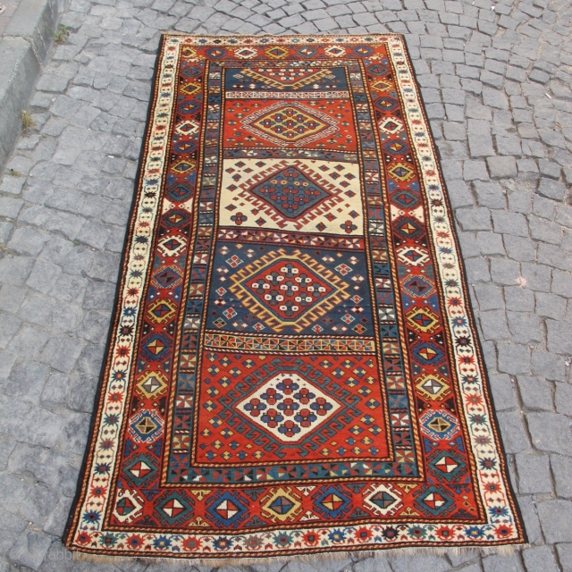 Antique Kasak carpet, excellent condition, all vegetable colours, %5 repaired, no any hole, just little control. 
Size: 90 x 46 inches (2,29 x 1,16 cm). 
Circa 1890's.      