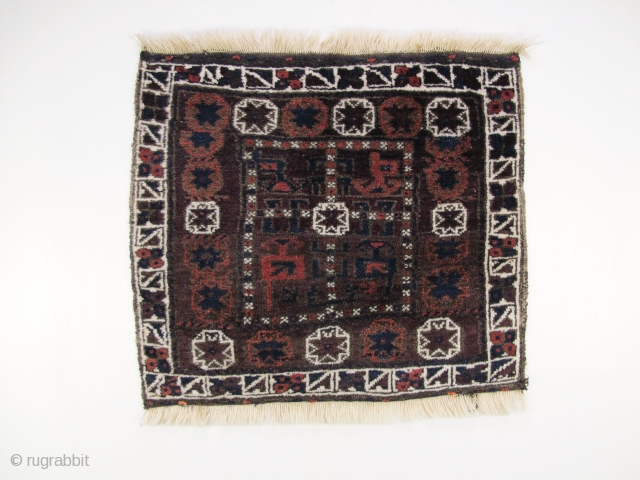 Baluch Bagface, Circa 1900, Very good condition and pile, All natural colours, Size: 76 x 66 cm.                