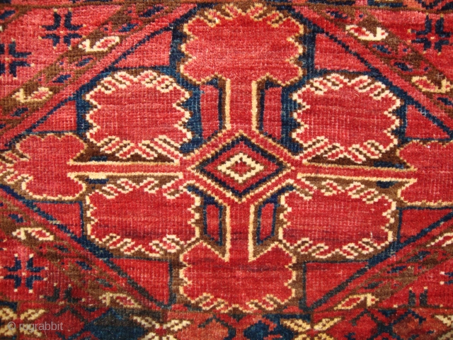 A Ersari-Bashir??? Torba, Circa 1870??? Good condition with natural colours and shiny wool, A small restoration(see photo), Size: 130 x 44 cm.           