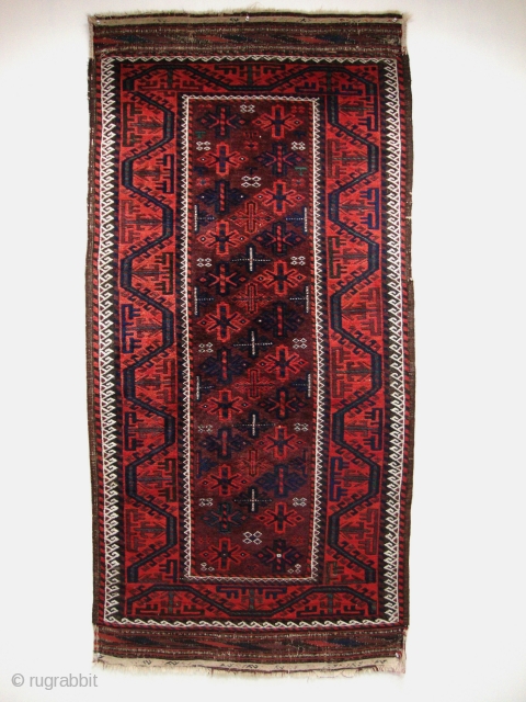 A Baluch rug, Circa 1900? Very good and original condition (see photos), Shiny wool, Not restored, All colours natural, Size: 210 x 100 cm.         