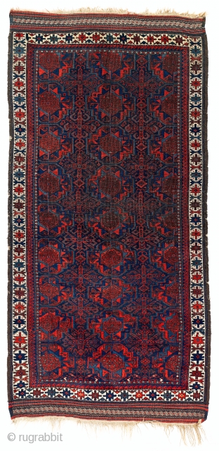 Baluch with Turkmen design, Circa 1900, Good en original condition, Not restored, Size: 200 x 98 cm. 79" x 38.5" inch.            