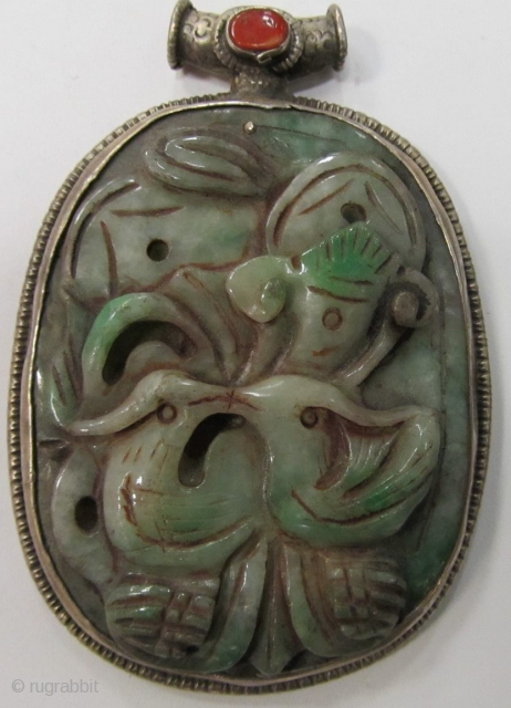 Double sided Carved Jade and Silver Pendant                          