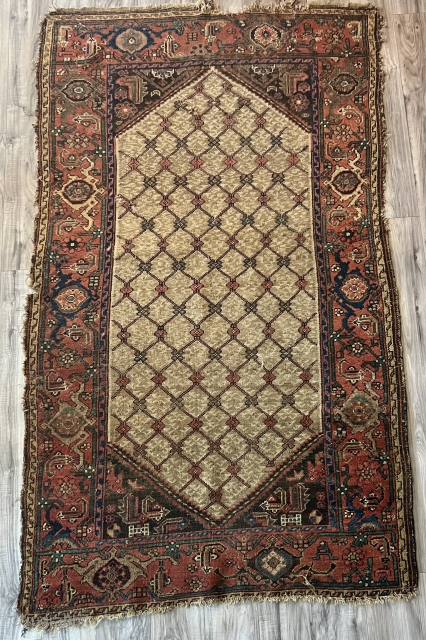 
Antique Bidjar Rug 

Antique Bidjar Rug 4' x 7.3’  Wool foundations, as here, characterize the extremely robust weaving of the Kurds in and around Bidjar.  The camel hair-colored lattice center  ...
