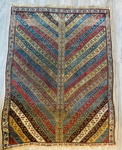 Antique Mahabad Savojbolagh Kurdish Rug


Beautiful florals and Rare design.

Condition: there is some wear throughout but commiserate with age.



64” x 47”             