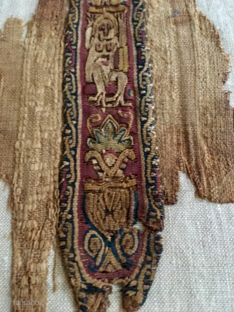 Coptic textile, polychrome wool and linen, 3rd the 6th . Century.
Mounted on linen stretcher 360mm x 230mm. Textile is about 10 inches top to bottom.
        