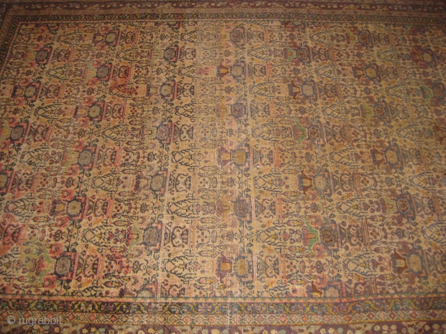 Very old Persian carpet in low pile, size: 7 by 5 ft approximately.                    