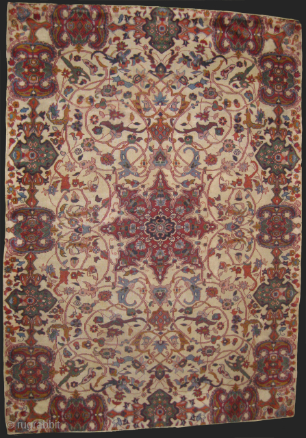 An Indian Spiral field carpet measuring 4 x 6 feet, couple of wear areas.