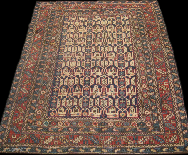 Kuba Konagkend carpet measuring 4.10 x 3.9 feet.                         