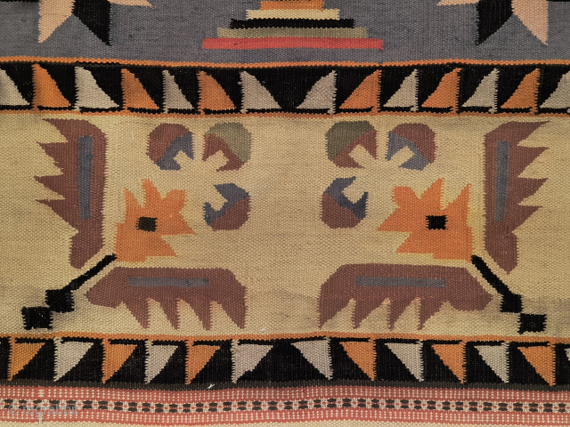 Cotton Dhurrie with Cintamani motif.