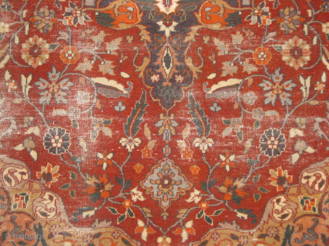 Early Indian carpet with wear areas.