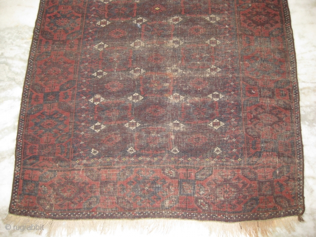 Baluch rug with wear throughout, measuring 6.9 x 3.4 ft                       
