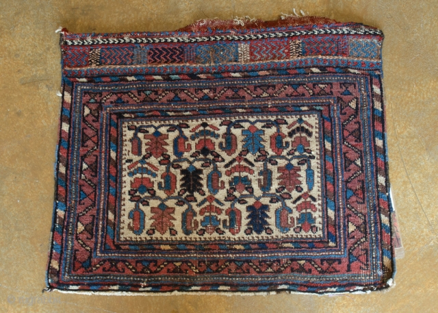 Antique Afshar. This is a fine Boteh Tribal Afshar. Very nice skirt with colorful chevrons.

width: 1'7"
length: 2'0"
size category: 3'x5' and smaller
dominant colors: Red, Blue & Beige       