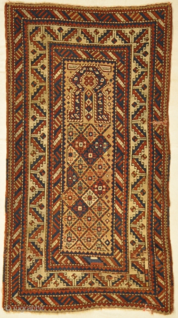 19th Century Caucasian Prayer Rug. Rare Kazak prayer rug on a gold background, ivory border. Wool foundation, red wefts, all natural colors no synthetics.         