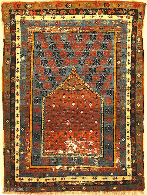 Antique Turkish Prayer Rug
A beautiful antique Turkish prayer rug. Used for religious rituals. A genuine and authentic piece of woven carpet art sold by the Santa Barbara Design Center.

3' x 4'3"  