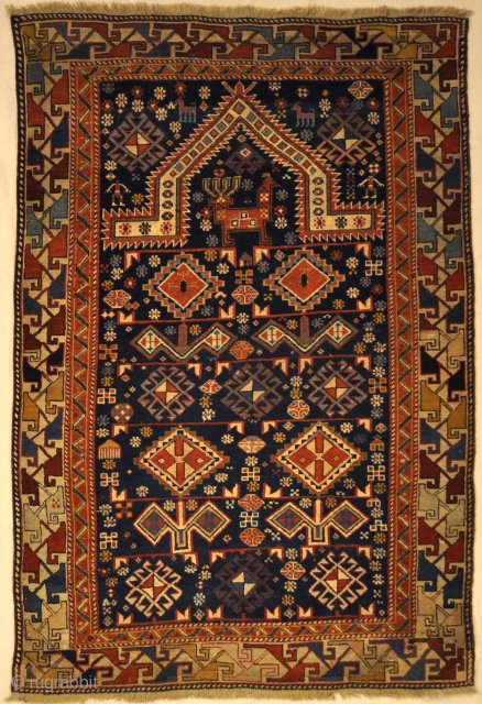 Antique Shirvan Rug Featuring Peacock and Two Men
3’4″ x 5’9″                       