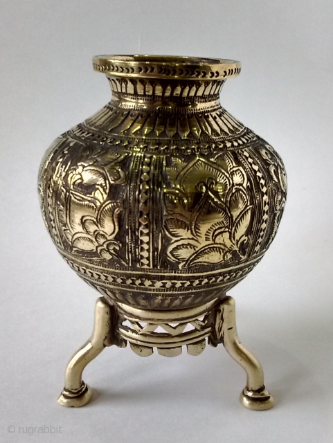 A very fine, cast brass holy water pot, with very fine and intricate flower workmanship. 3 different flowers all around pot. Pot with stand of brass as well. Height with stand: 11.3  ...